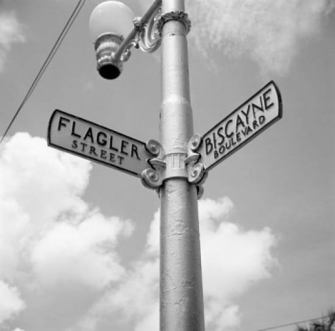 Low angle view of street name signs Canvas Art - (24 x 36)