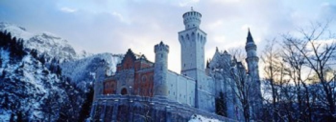 Low angle view of the Neuschwanstein Castle in winter Bavaria Germany Canvas Art - Panoramic Images (18 x 7)