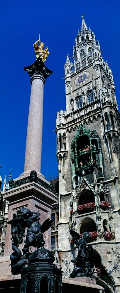 Low angle view of the New Town Hall and St Marys Column Marienplatz Munich Bavaria Germany Canvas Art - Panoramic Images (6 x 15)