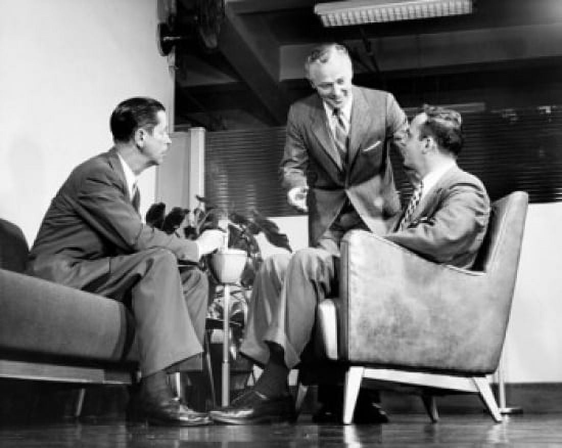 Low angle view of three businessmen talking Canvas Art -  (18 x 24)