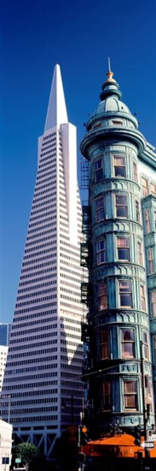 Low angle view of towers Columbus Tower Transamerica Pyramid San Francisco California USA Canvas Art - Panoramic Images (18 x 6)