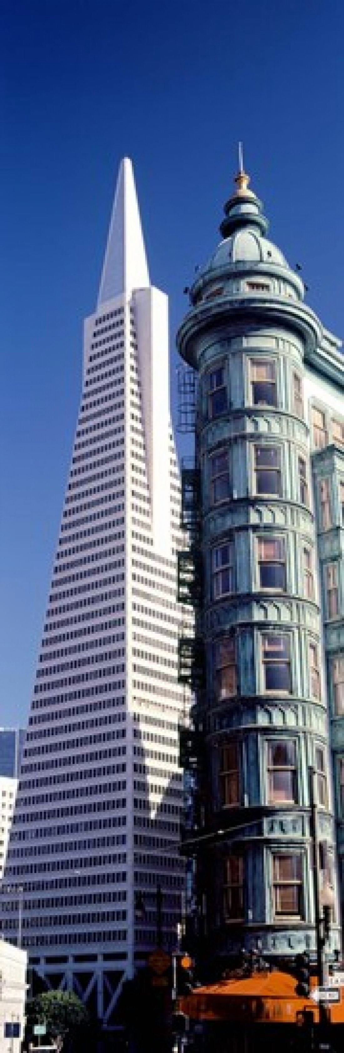 Low angle view of towers Columbus Tower Transamerica Pyramid San Francisco California USA Canvas Art - Panoramic Images (36 x 12)