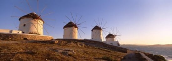 Low angle view of traditional windmills Mykonos Cyclades Islands Greece Canvas Art - Panoramic Images (36 x 13)