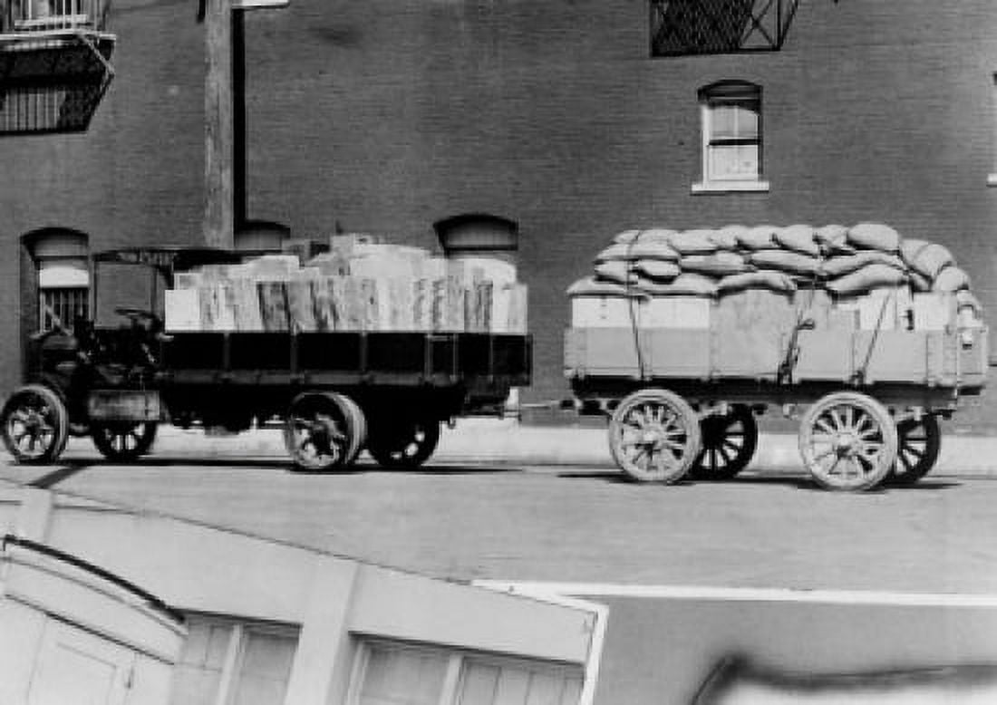 Low angle view of truck attached to cart on road Canvas Art - (18 x 24)