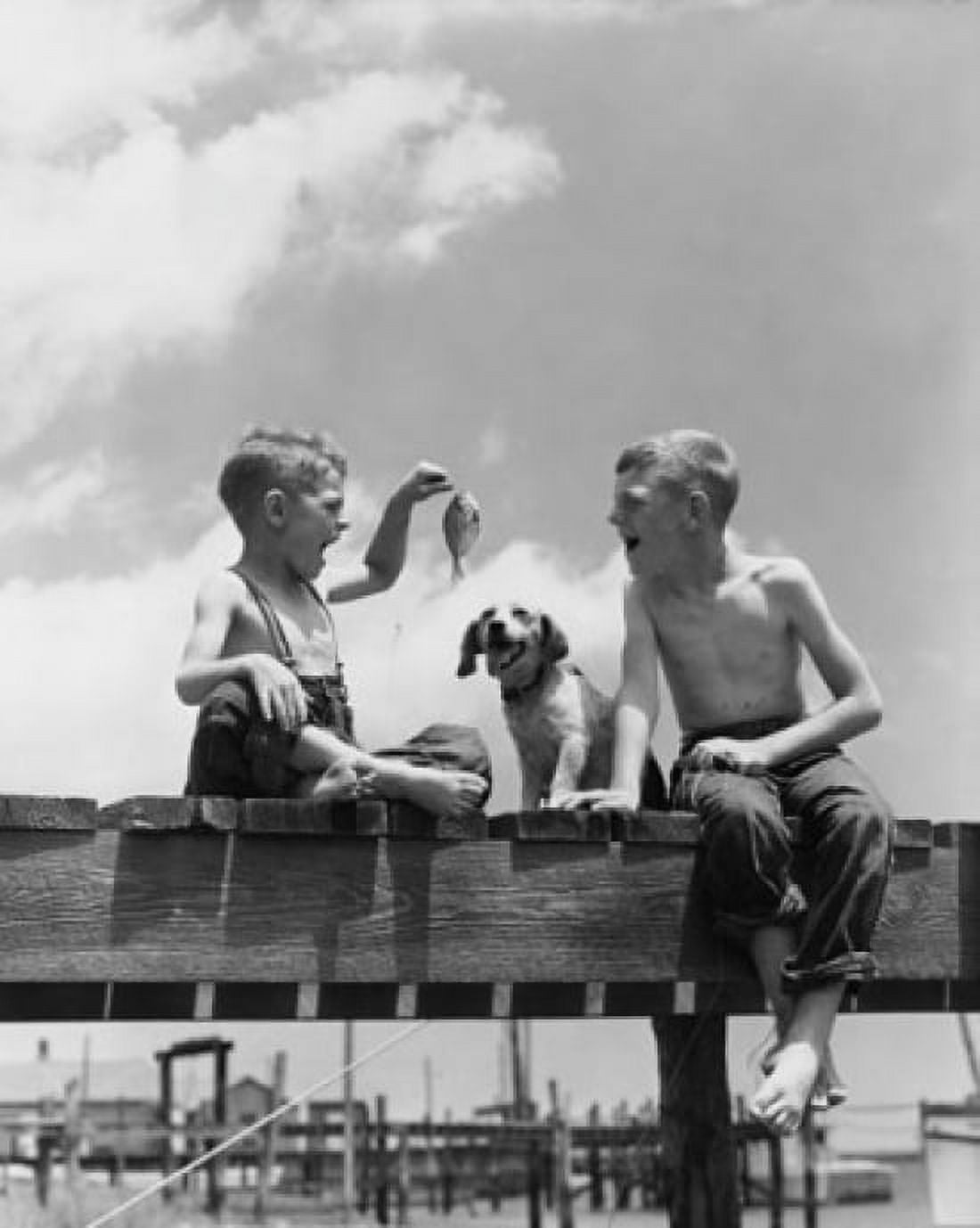 Low angle view of two boys fishing Canvas Art - (18 x 24)