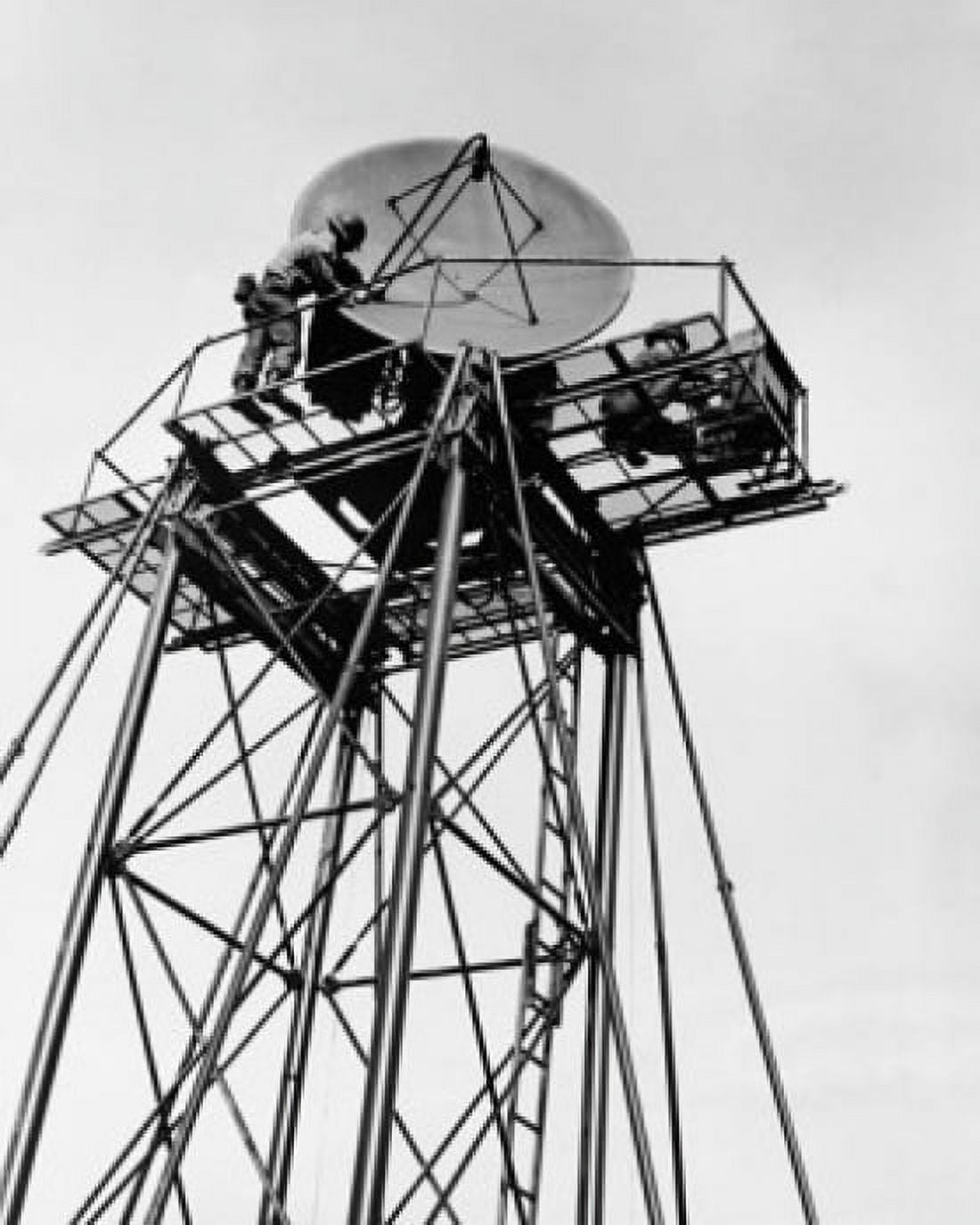 Low angle view of two military technician repairing a radar Canvas Art - (24 x 36)