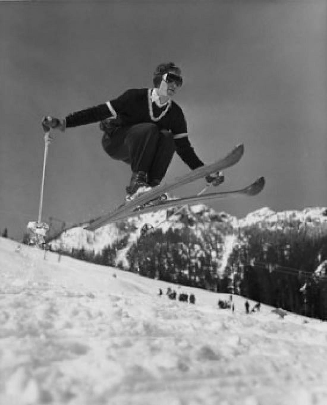 Low angle view of young man skiing downhill Canvas Art - (18 x 24)