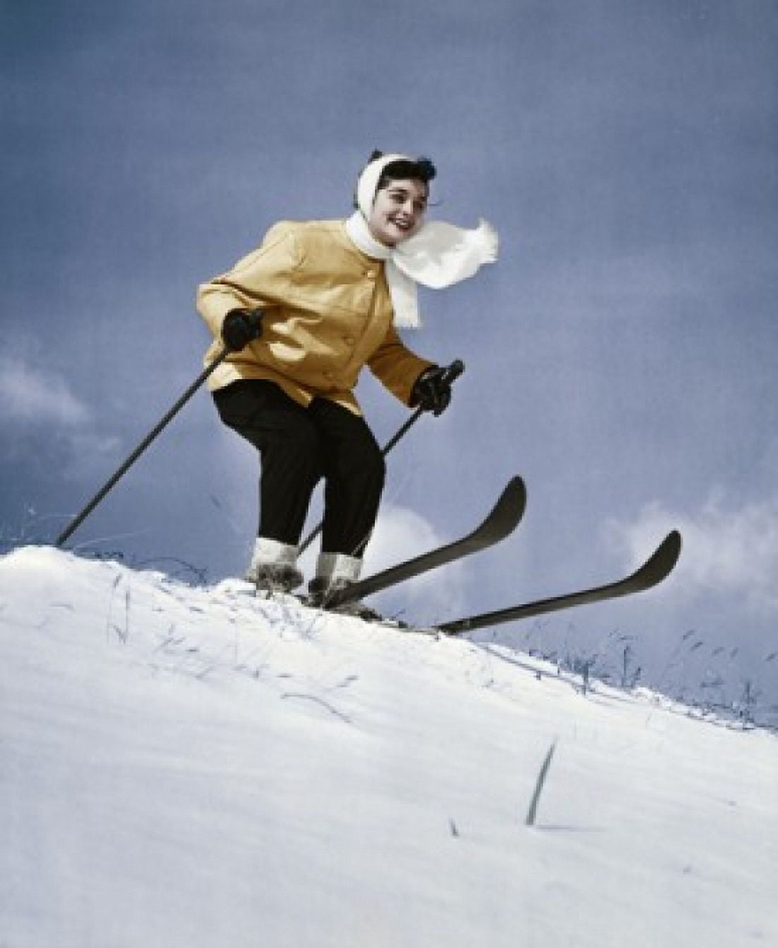 Low angle view of young woman skiing downhill Canvas Art - (18 x 24)