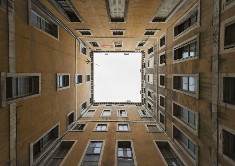 Low angle view to the sky from inside the four walls of a building Venice Veneto Italy Canvas Art - Mats Silvan Design Pics (18 x 13)