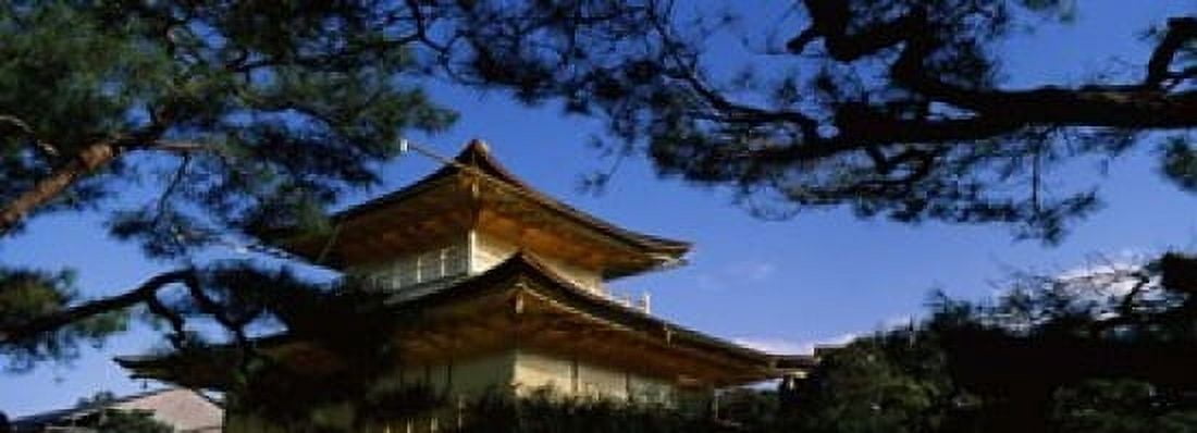 Low angle view of trees in front of a temple Kinkaku-ji Temple Kyoto City Kyoto Prefecture Kinki Region Honshu Japan Canvas Art - Panoramic Images (18 x 7)