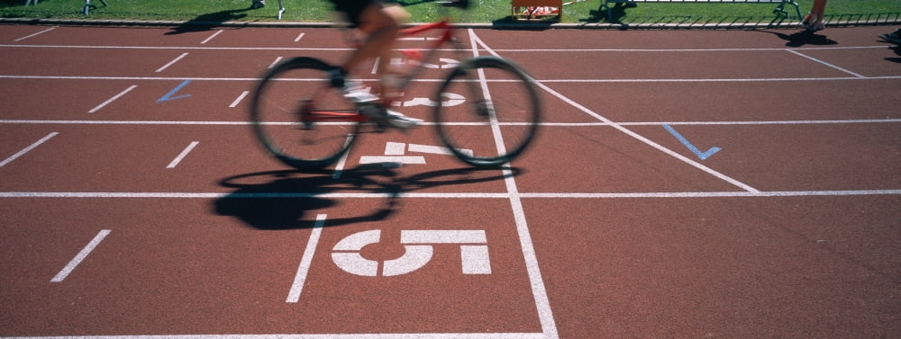 Low section view of a man cycling on sports track Kirchzarten Germany Canvas Art - Panoramic Images (27 x 9)