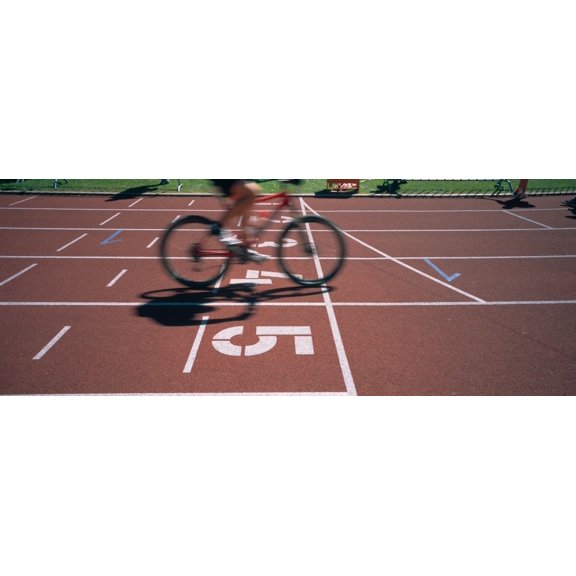 Low section view of a man cycling on sports track, Kirchzarten, Germany Poster Print (36 x 12)