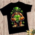 thumbnail image 1 of Lucky Bigfoot Shamrock St Patrick’s Day Graphic T-Shirt, Irish Sasquatch Clover Holiday Theme Unisex Cotton T-Shirt, Size S-5XL, 1 of 3