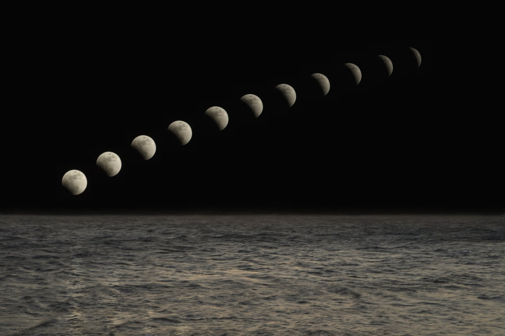 Lunar Eclipse In A Black Sky Thunder Bay Ontario Canada Canvas Art - Susan Dykstra Design Pics (19 x 12)