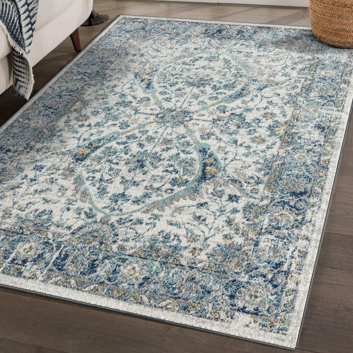 Ivory and Blue Oriental Synthetic 8' x 10' Area Rug