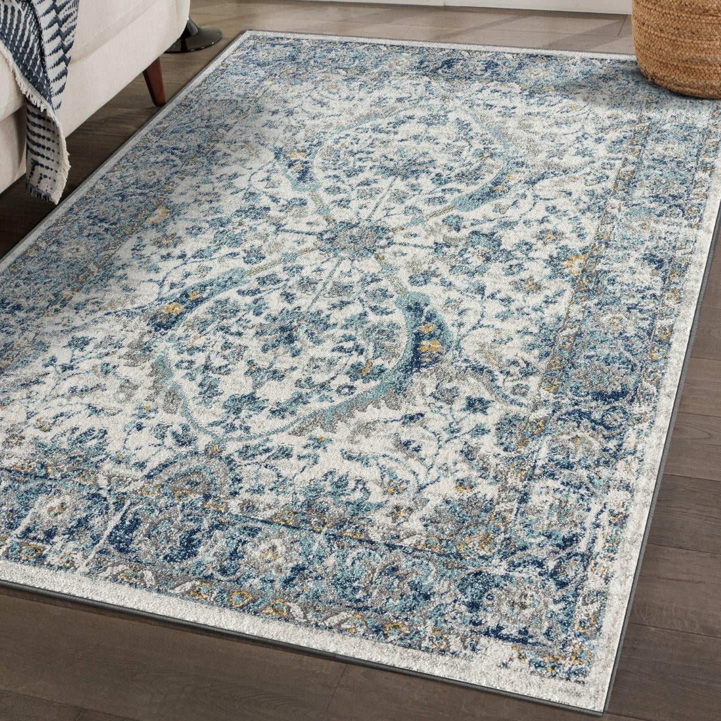 Ivory and Blue 9' x 12' Synthetic Oriental Area Rug