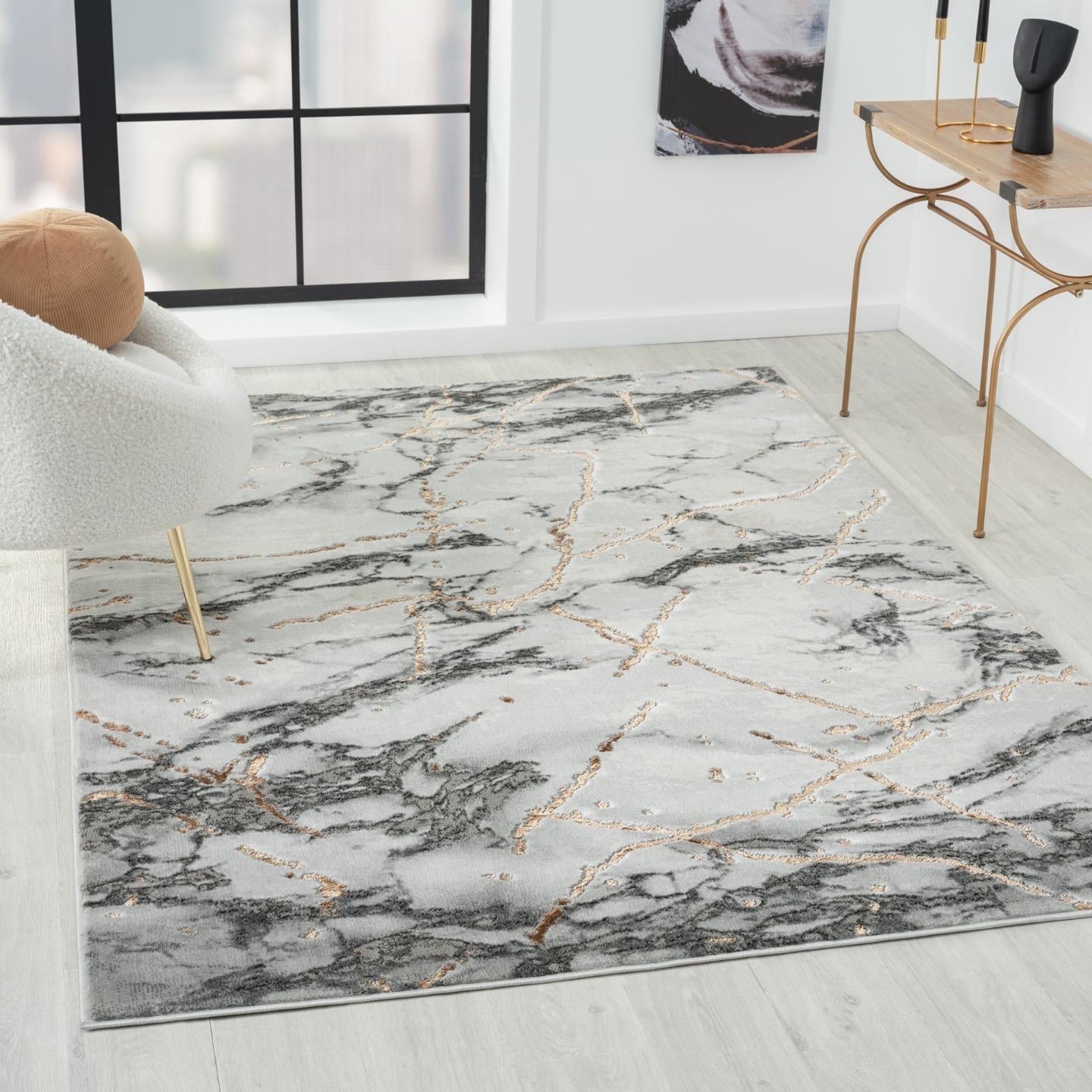 Ivory and Gold Abstract Marble 8' x 10' Synthetic Area Rug