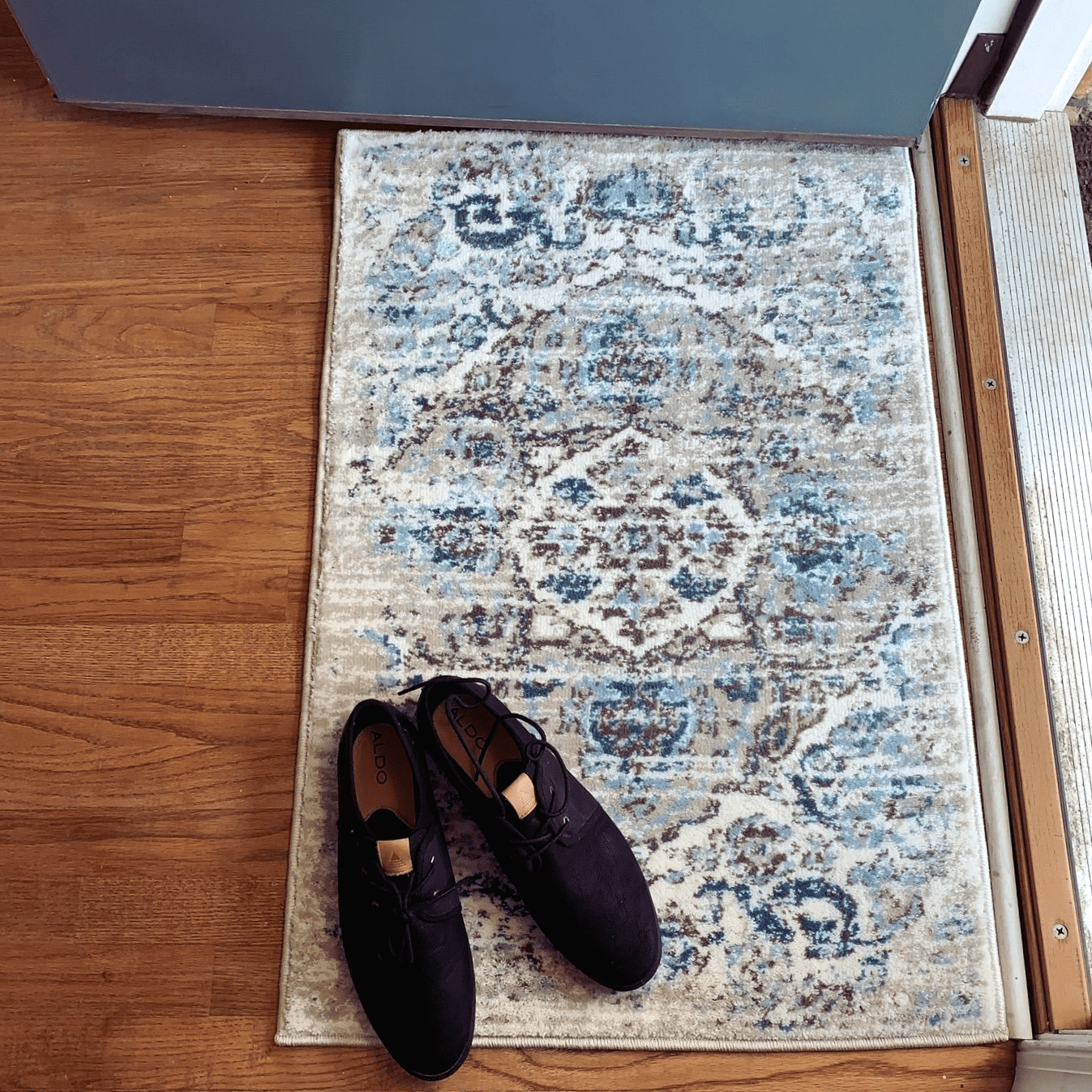 Cream and Blue 9' x 12' Oriental Synthetic Area Rug