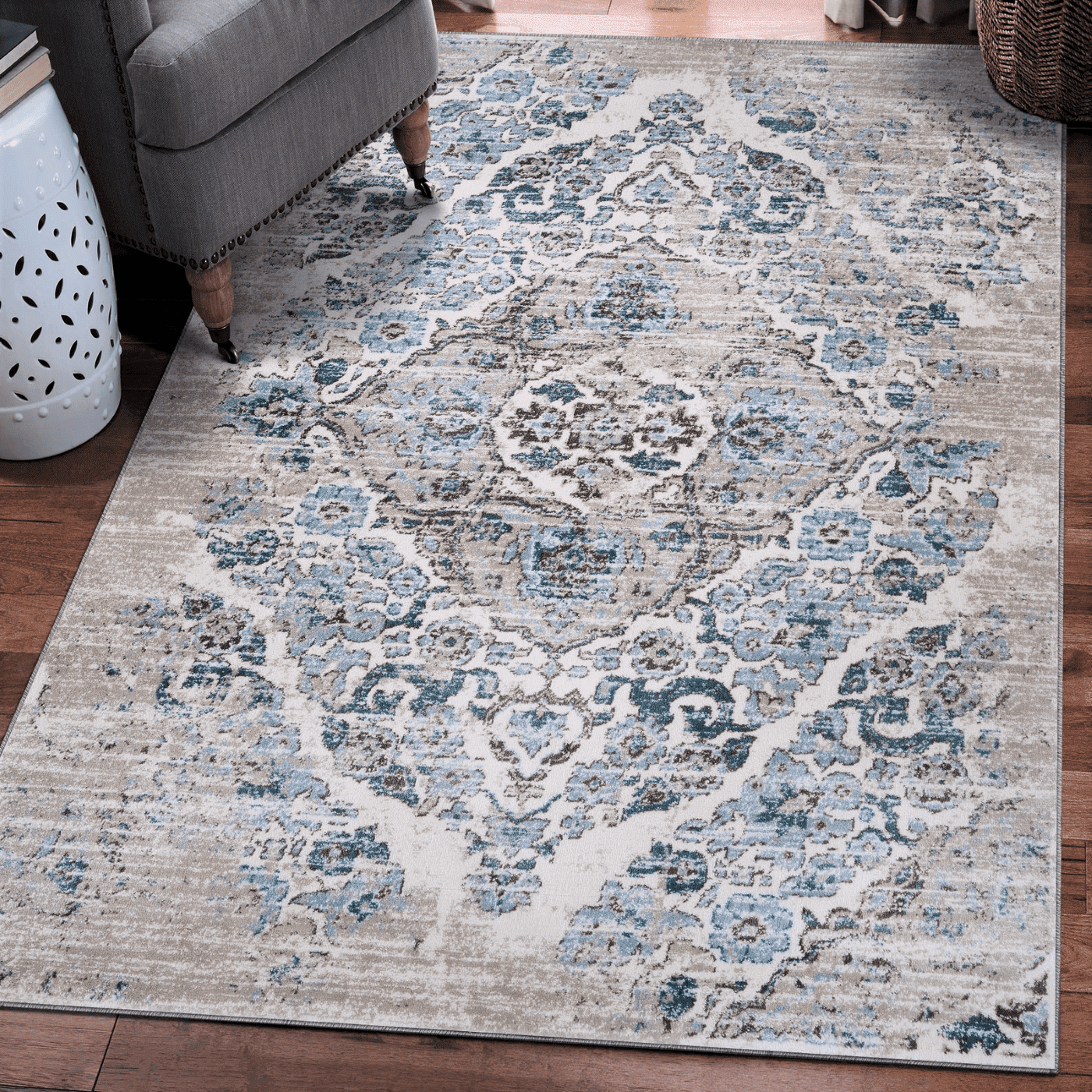 Cream and Blue 4' x 6' Synthetic Oriental Area Rug