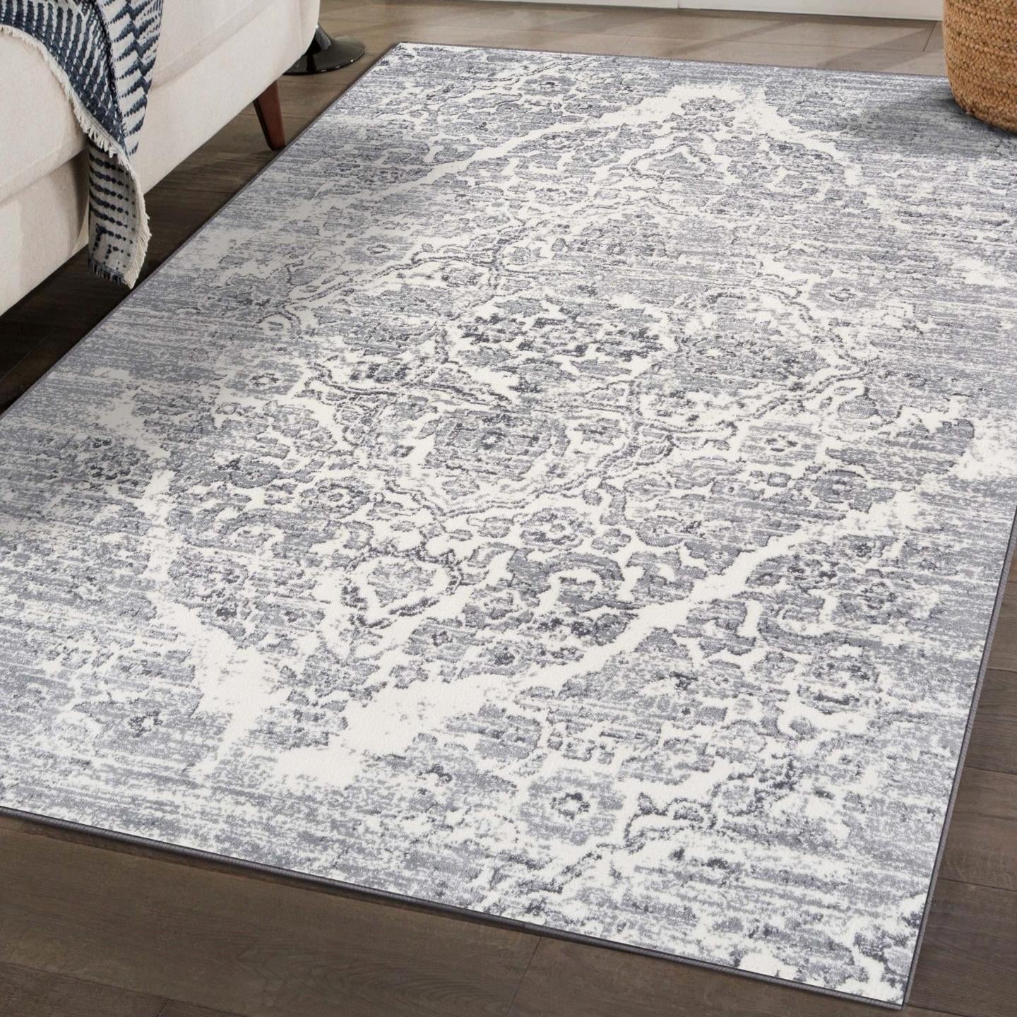 Silver 5' x 7' Distressed Oriental Synthetic Area Rug