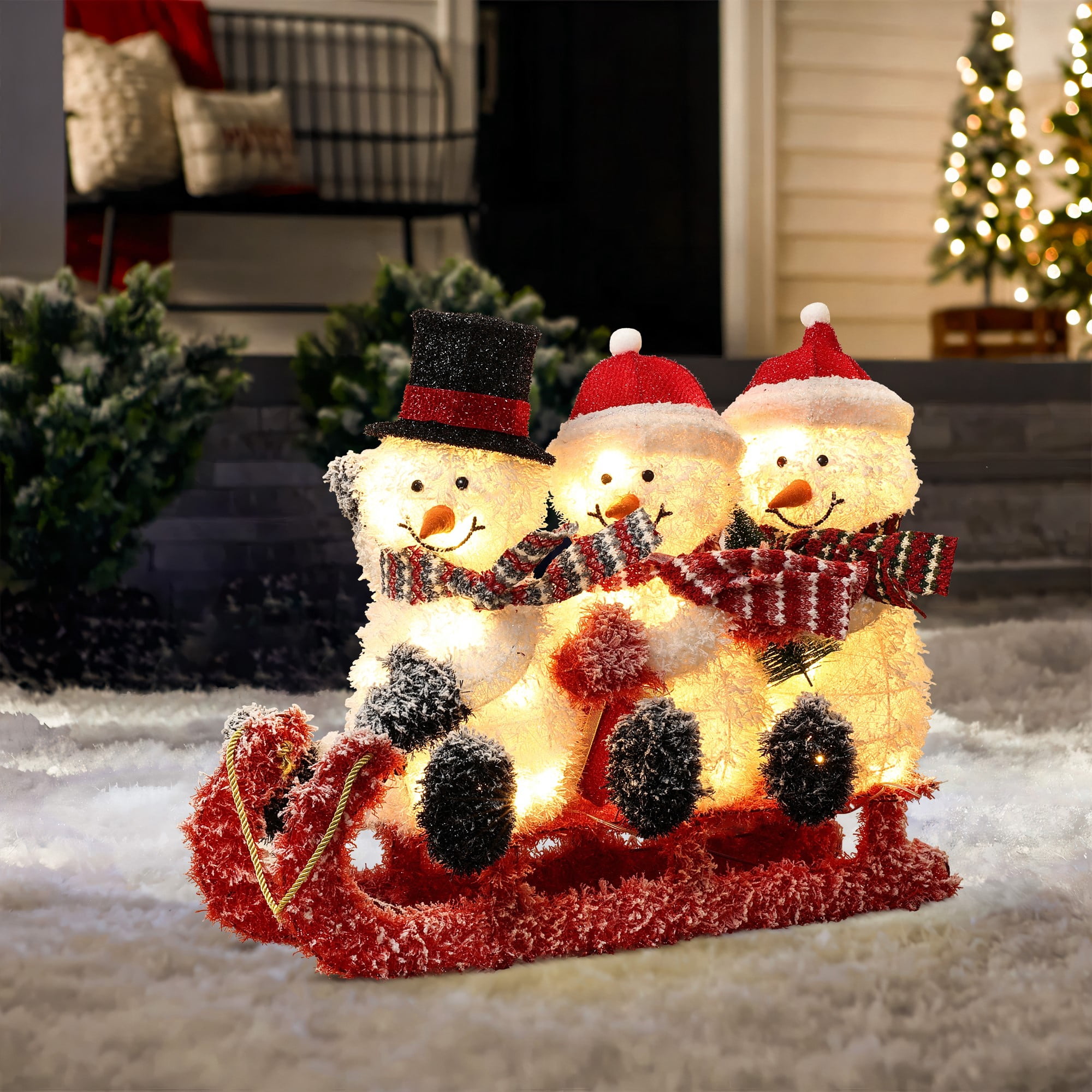 LuxenHome Snowman Family Trio on Sled with Lights Outdoor 