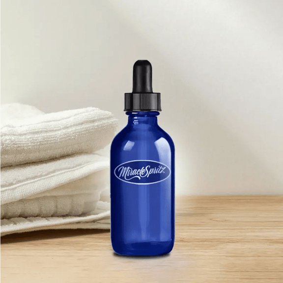 Luxury Anti-Aging Face and Hair Serum 2oz dropper by Miracle Spritz