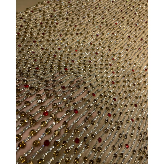 Luxury Lace: Hand-Beading Savoraski Stones for Prom Gowns and Occasional Wear