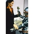 thumbnail image 1 of Lynda Carter in Wonder Woman as Diana Prince in black suit with alien creature 24x36 Poster, 1 of 1