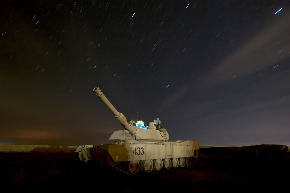 M1 Abrams tank at Camp Warhorse Canvas Art - Terry MooreStocktrek Images (35 x 23)