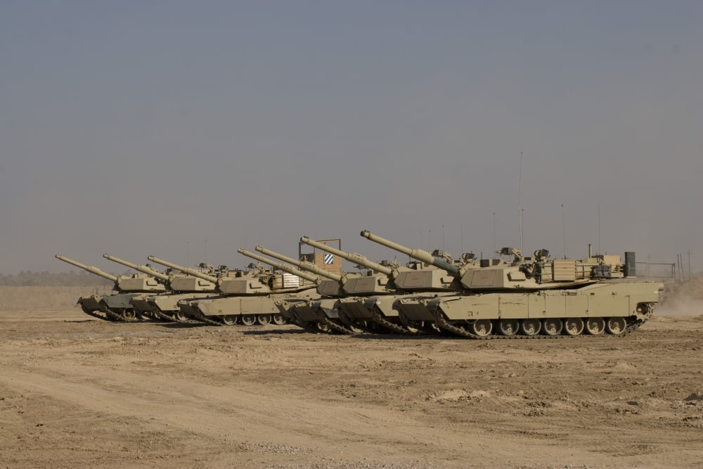 M1 Abrams tanks at Camp Warhorse Canvas Art - Terry MooreStocktrek Images (35 x 23)
