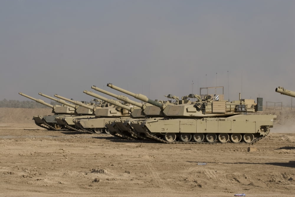 M1 Abrams tanks at Camp Warhorse Canvas Art - Terry MooreStocktrek Images (35 x 23)