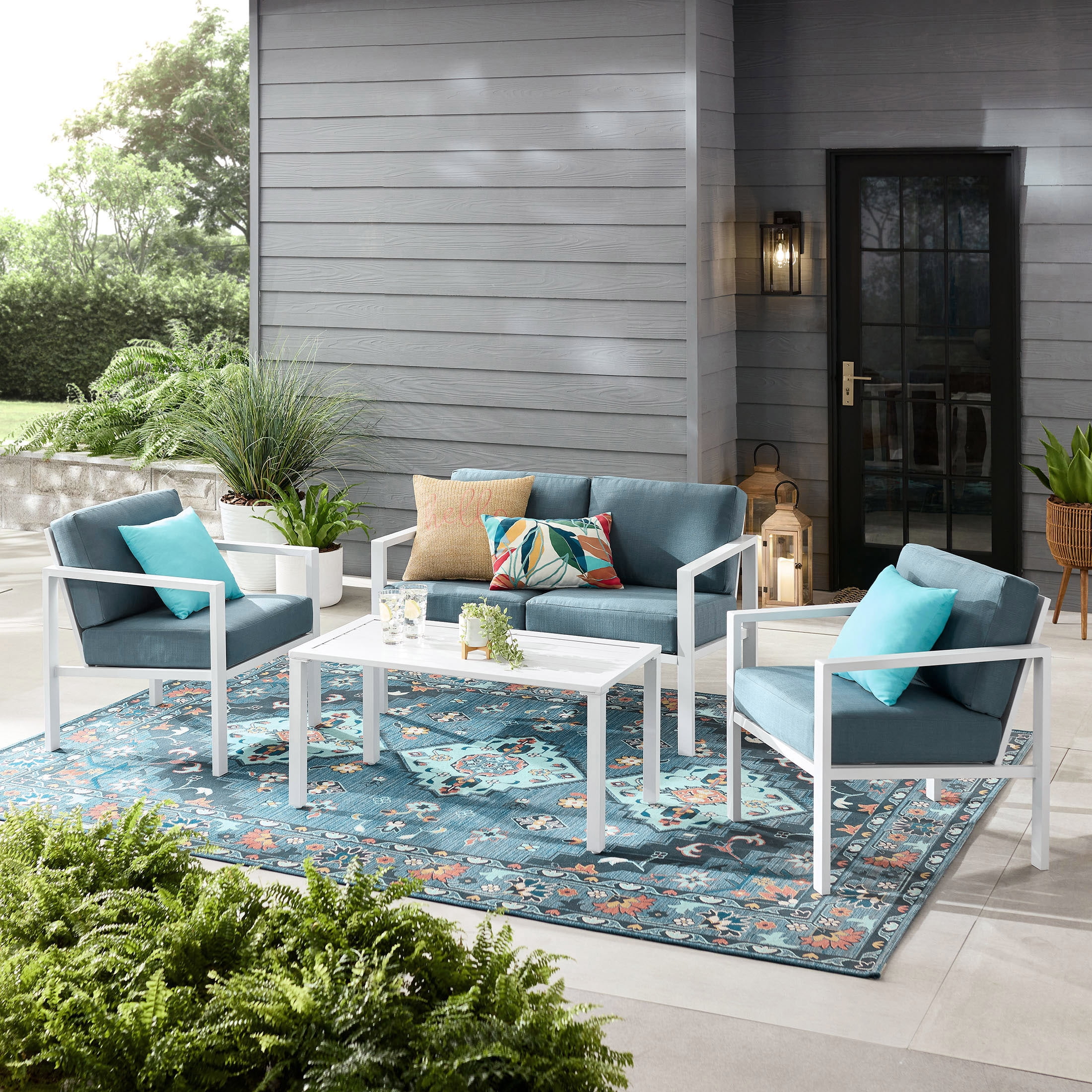 Mainstays Dashwood 4-Piece Outdoor Conversation Set, White Frames with Blue Cushions