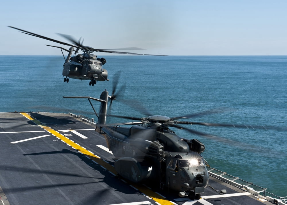MH-53E Sea Dragon helicopters take off from the flight deck of USS Wasp Canvas Art - Stocktrek Images (34 x 24)