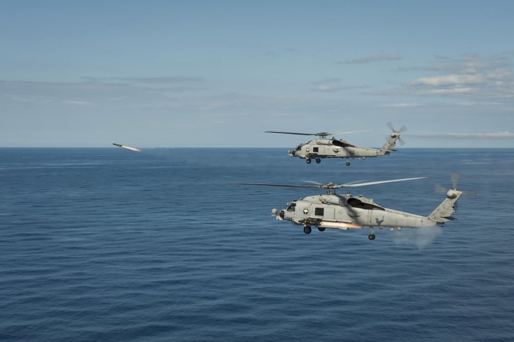 MH-60R Sea Hawk helicopters launch AGM-114 hellfire missiles Canvas Art - Stocktrek Images (35 x 23)