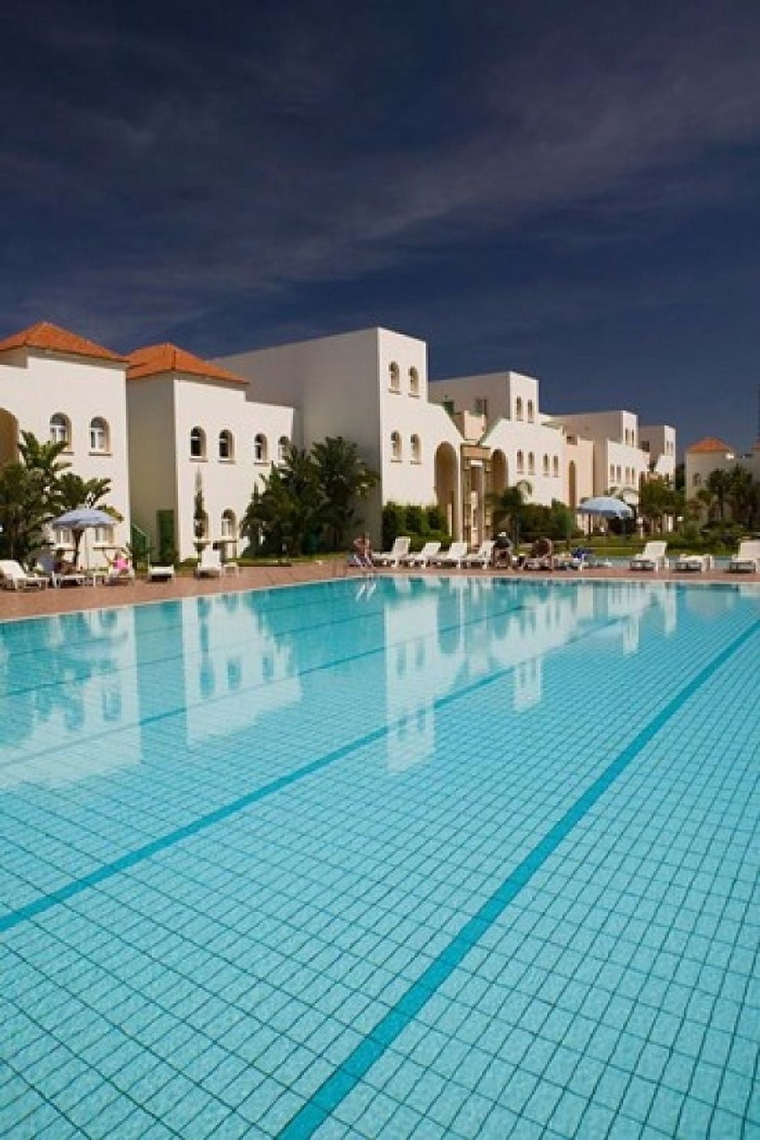 MOROCCO ESSAOUIRA Ryad Mogador Hotel Pool Canvas Art - Walter Bibikow DanitaDelimont (24 x 36)