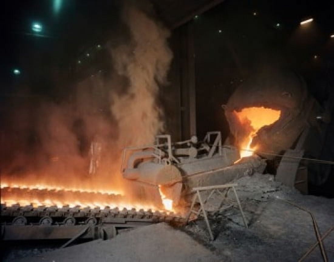 Machinery pouring molten titanium iron into pig molds Canvas Art - (24 x 36)