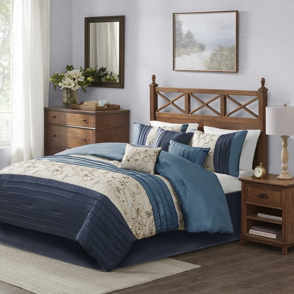 Madison Park Cal King Faux Silk Comforter Set with Decor Pillow and Bed Skirt Embroidered Pieced 7-Piece Bedding Set, Navy