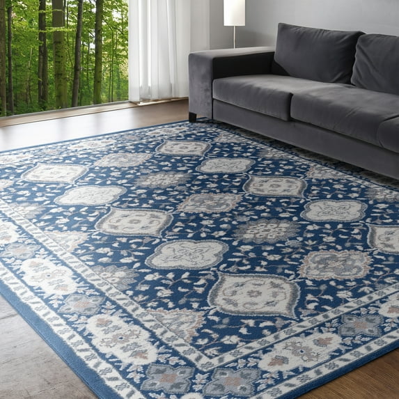 Madison Traditional 7.6' x 10' Navy and Cream Polypropylene Indoor Area Rug