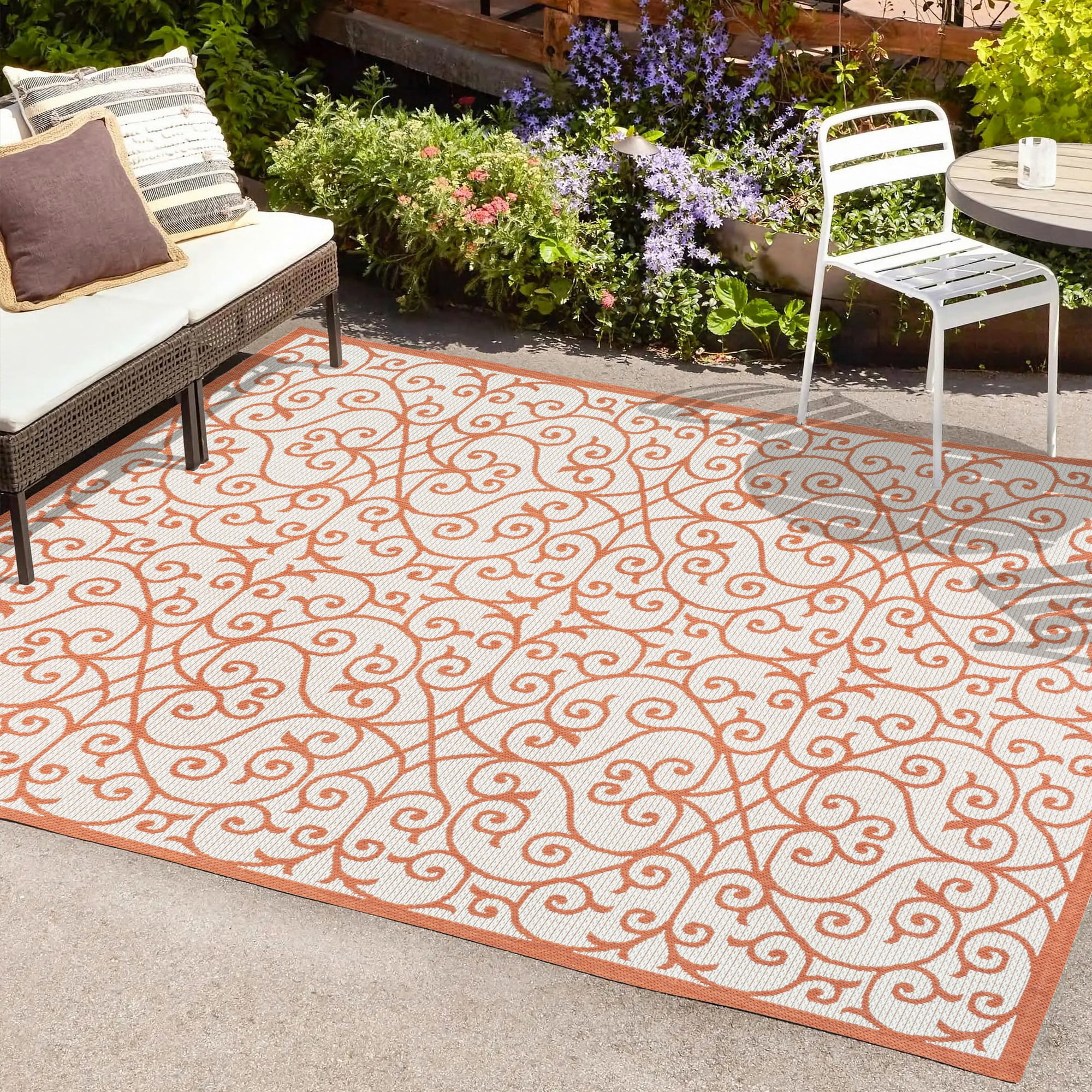 Cream and Orange 8' x 10' Synthetic Flat Woven Reversible Rug