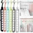 thumbnail image 1 of Magic Clothes Hangers, 4 Pack Wardrobe Hangers Multi Functional Closet Hangers Rotate Anti-Skid Folding Hanger for Dormitory, Bedroom, Bathroom, Green, 1 of 2
