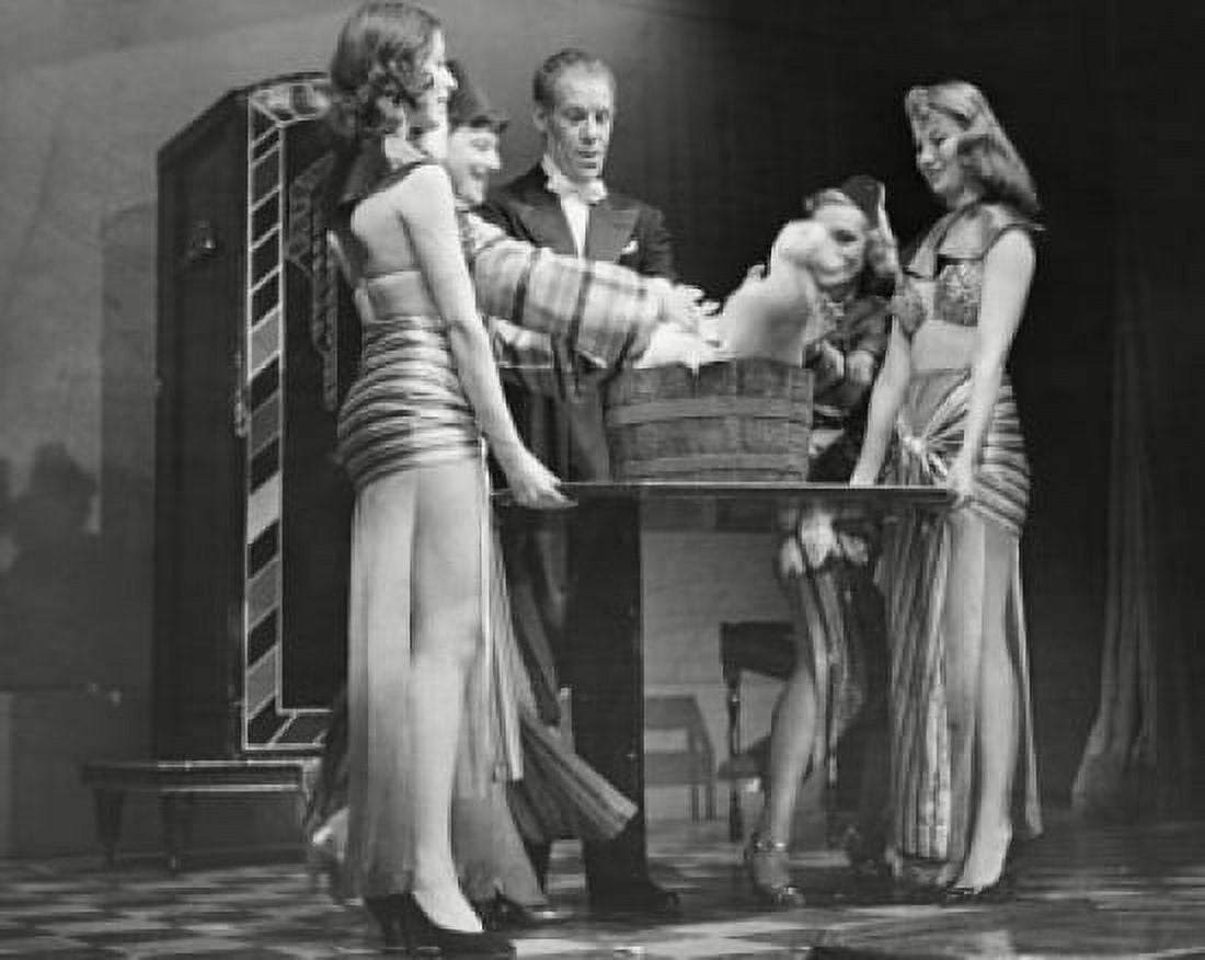 Magician performing tricks on stage Canvas Art - (18 x 24)