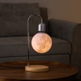 thumbnail image 1 of Magnetic Levitating Moon Lamp Levitation Plastic Black Table LED Night Light Zero-Gravity Floating Desk Toys for Decoration Gifts Present with Phone Wireless Charging Pad, 1 of 8