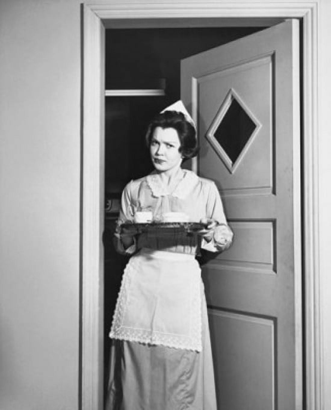 Maid holding a tray and standing at a door Canvas Art - (24 x 36)