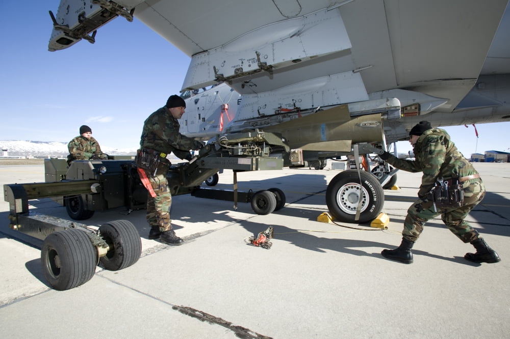 Maintenance crew loads an AGM-65 Maverick missile on an A-10 Thunderbolt Canvas Art - HIGH-G ProductionsStocktrek Images (18 x 12)