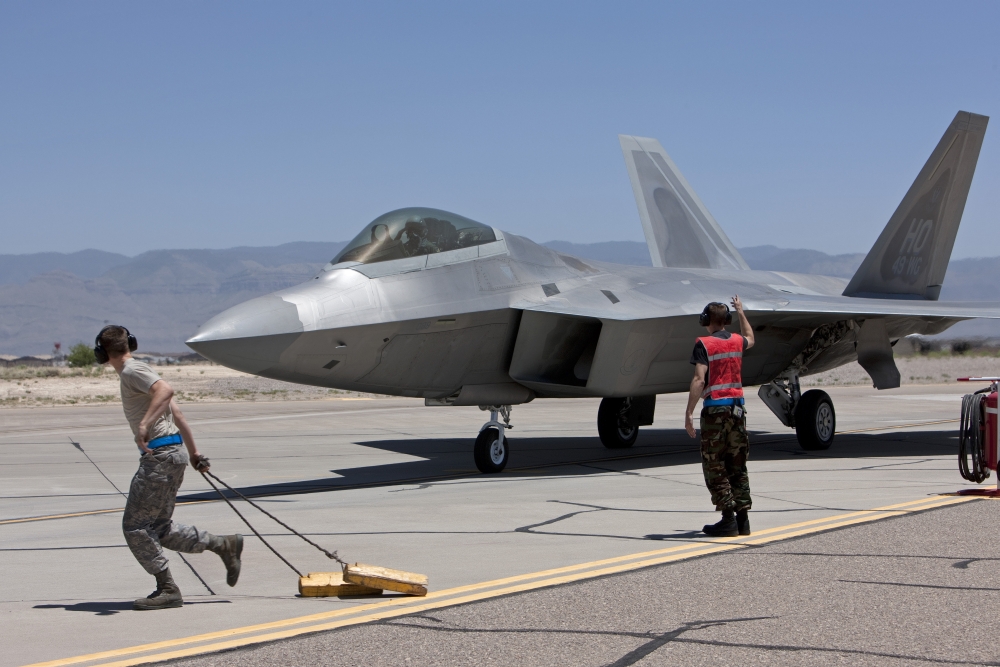 Maintenance crews perform preflight checks with F-22 Raptors Canvas Art - HIGH-G ProductionsStocktrek Images (18 x 12)