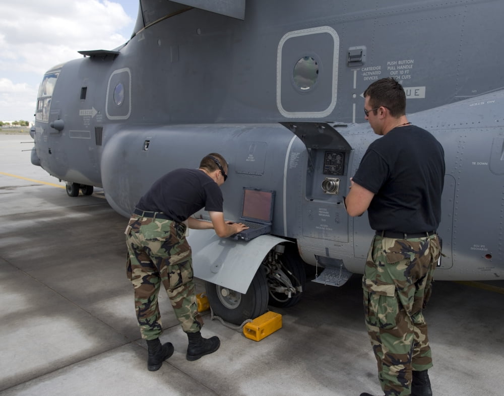 Maintenance personel work on a CV-22 Osprey Canvas Art - HIGH-G ProductionsStocktrek Images (16 x 13)