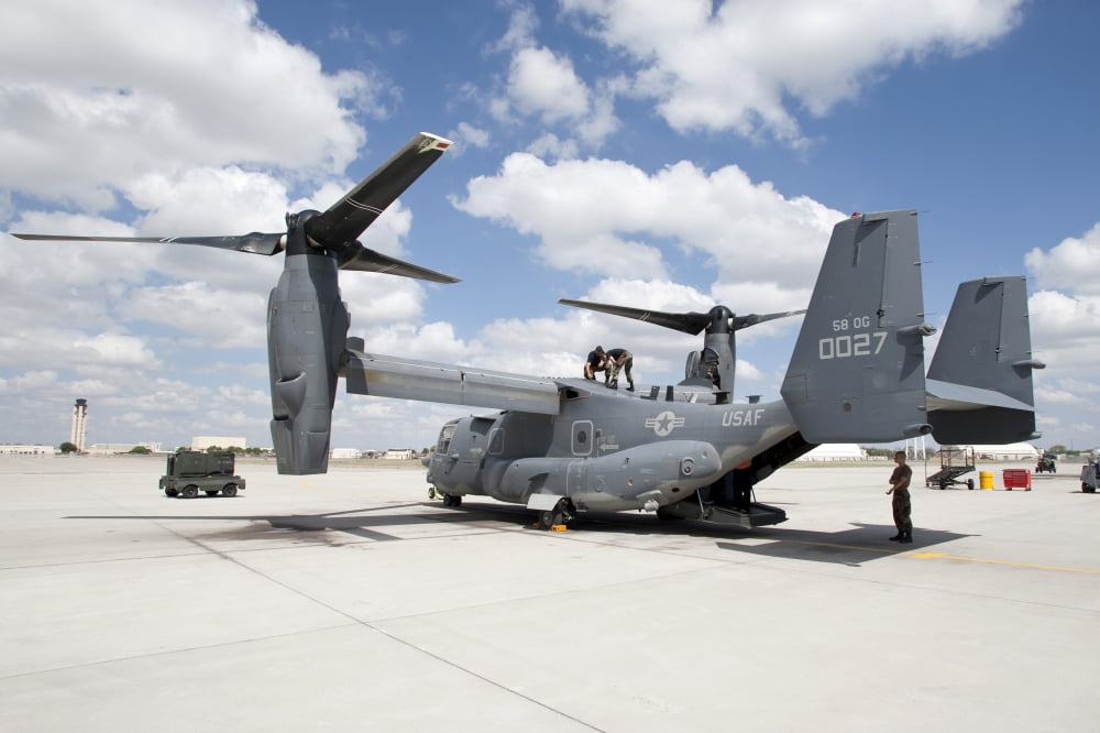 Maintenance personel work on a CV-22 Osprey Canvas Art - HIGH-G ProductionsStocktrek Images (36 x 24)