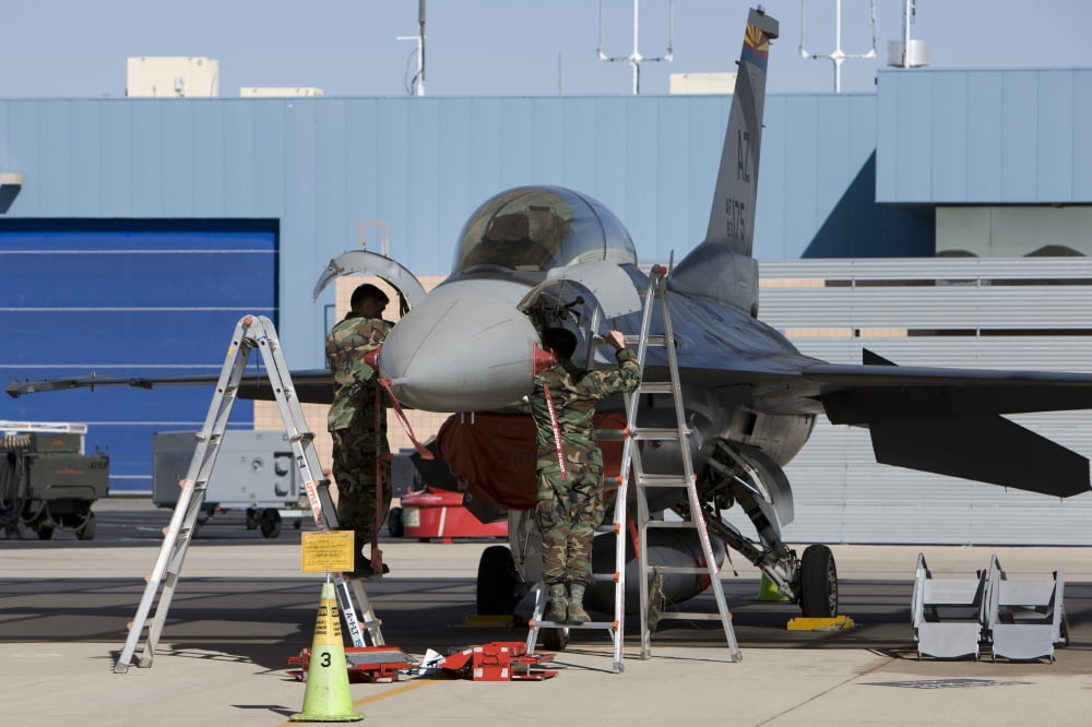 Maintenance personel work on an F-16 Fighting Falcon Canvas Art - HIGH-G ProductionsStocktrek Images (18 x 12)