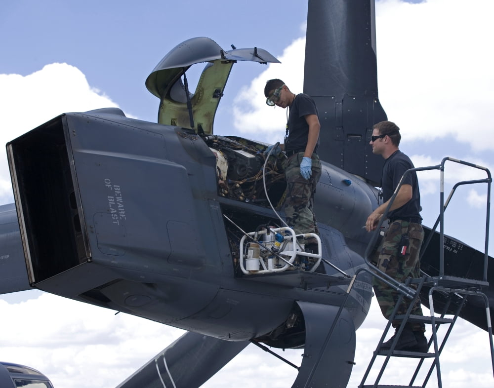 Maintenance personnel work on a CV-22 Osprey Canvas Art - HIGH-G ProductionsStocktrek Images (32 x 25)