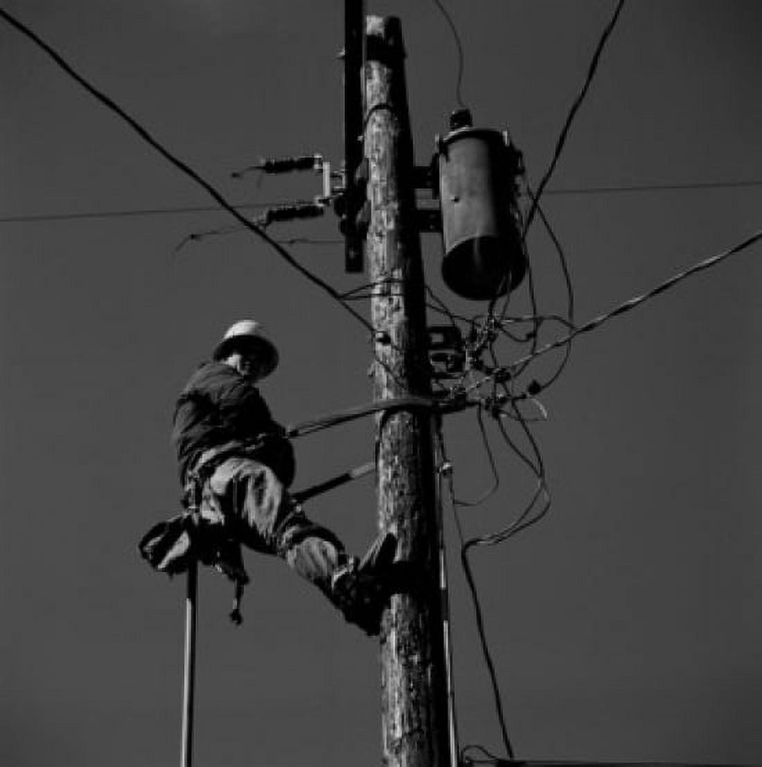 Maintenance worker repairing telegraph pole Canvas Art - (24 x 36)